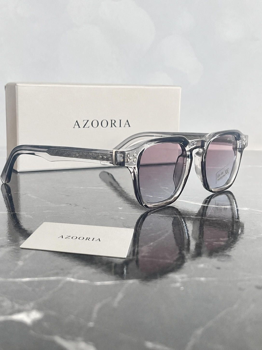 MOSCOT Crystal — vue côté avec carte AZOORIA