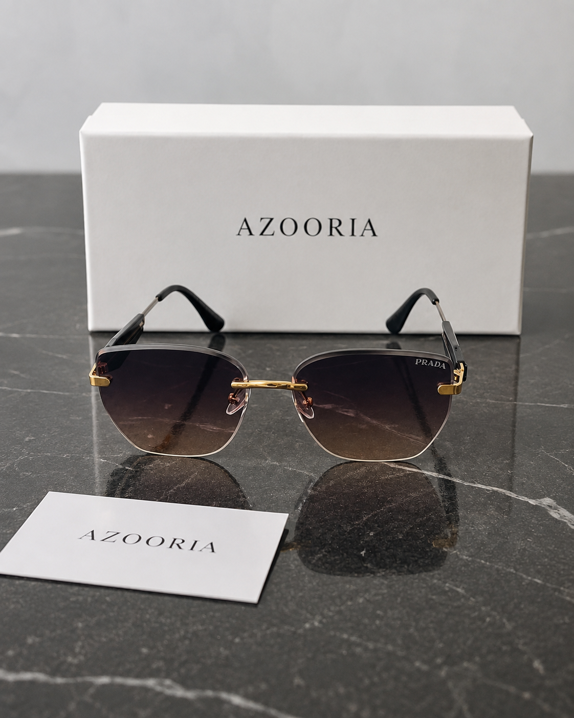 Prada Rimless Doré — vue face avec coffret AZOORIA