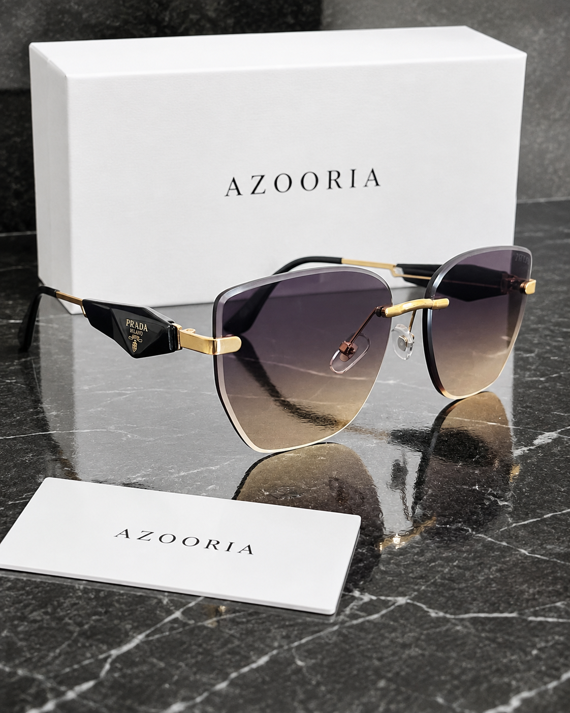 Prada Rimless Doré — vue angle avec coffret AZOORIA